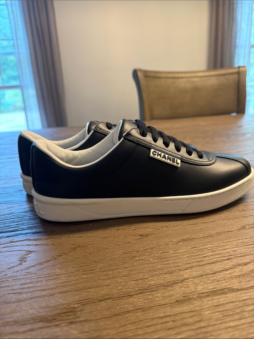 CHANEL Black and White Leather Low-Top Sneakers
